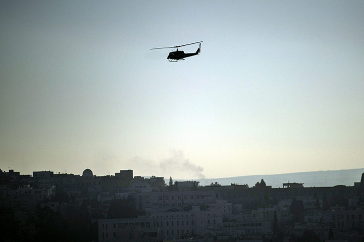 Tunisia: A military helicopter hovers over Tunis