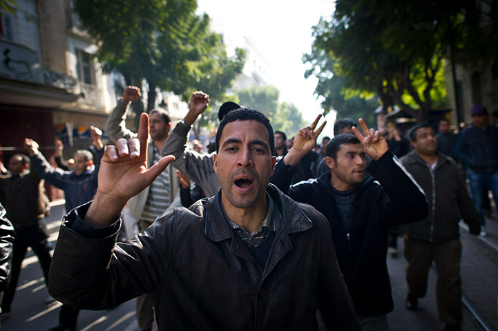 protests in tunisia: People demonstrate during a protest in central Tunis