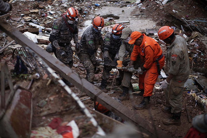Felipe Dana in Brazil: Rescue workers try to recover the body of a landslide victim, Nova Friburgo