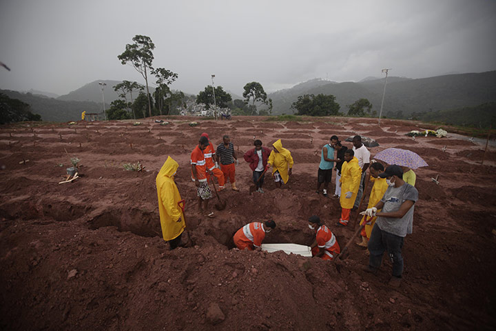 Felipe Dana in Brazil: People mourn during the burial of a landslide victim in Teresopolis, Brazil