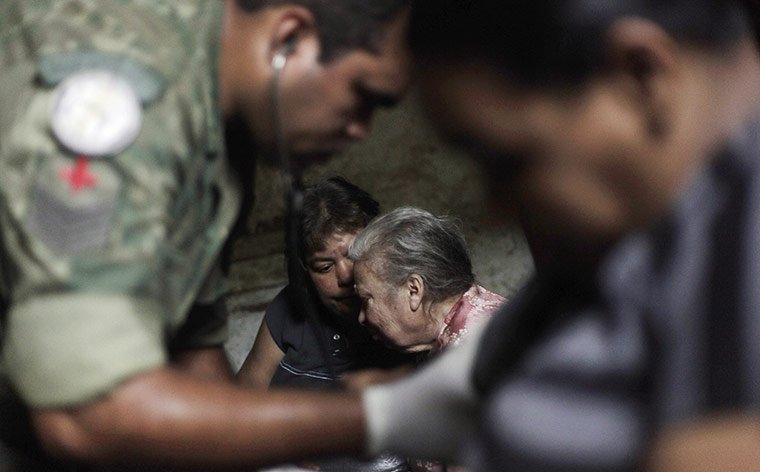 24 hours in pictures: landslide victim in Nova Friburgo
