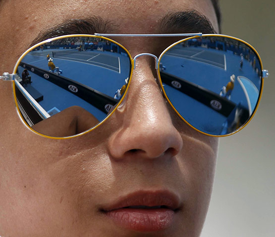 Australian Open Day 2: A spectator watches Marin Cilic's victory over Donald Young 