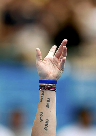 Australian Open Day 2: Romina Oprandi serves to Maria Kirilenko