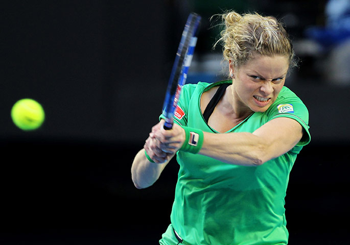 Australian Open Day 2: Kim Clijsters fires a return back to Darina Safina
