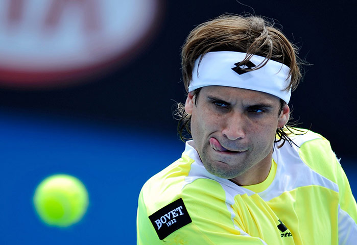 Australian Open Day 2: David Ferrer lines up a shot during his victory over Jarkko Nieminen 