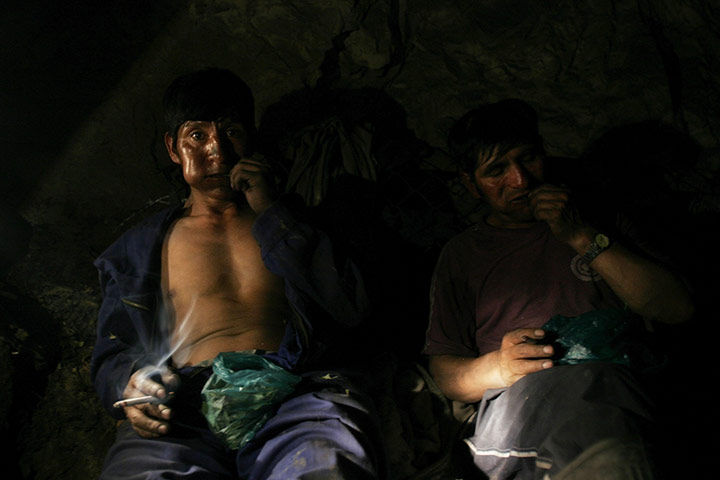 Coca products: Miners chew coca leaves in Oruro, Bolivia 