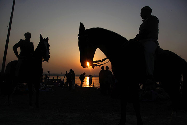 24 hours in pictures: Magh Mela festival in Allahabad, India