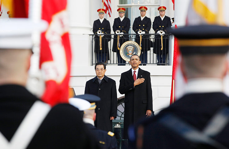 Hu Jintao Washington: Barack Obama salutes the flag with Chinese President Hu Jintao