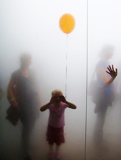 In pictures: blur: girl with orange balloon