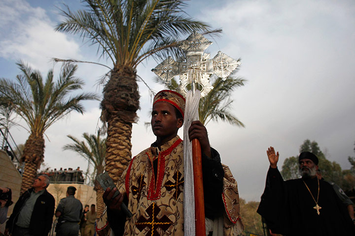 Orthodox epiphany: Christian pilgrims take part in a ceremony at the baptismal site 