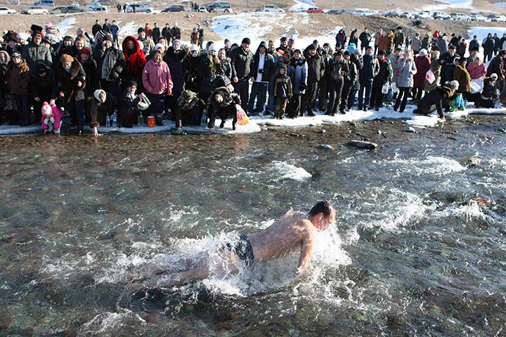 Orthodox epiphany: A believer bathes in the waters of the Kara-Balta river