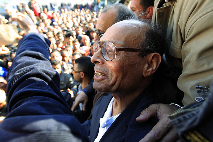 Tunisia uprising: Moncef Marzouki attends a protest in Sidi Bouzid
