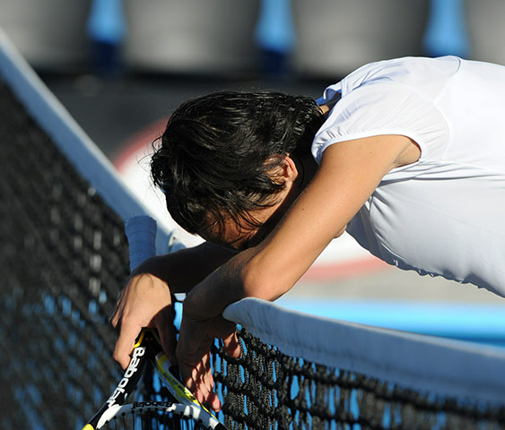Australian Open Day 3: Francesca Schiavone leans on the net after her victory