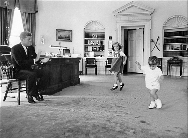 JFK Anniversary: John F.Kennedy Jr (R) dancing with his sister Caroline