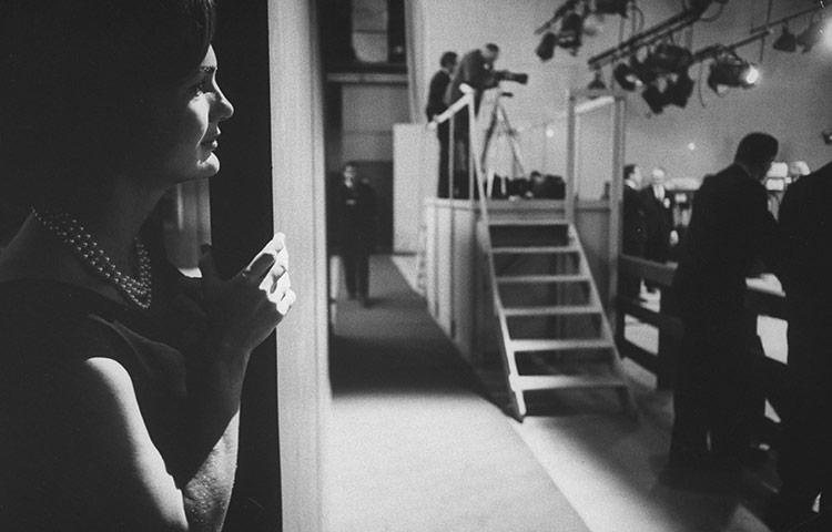 JFK Anniversary: Jacqueline Kennedy watching her husband during a debate