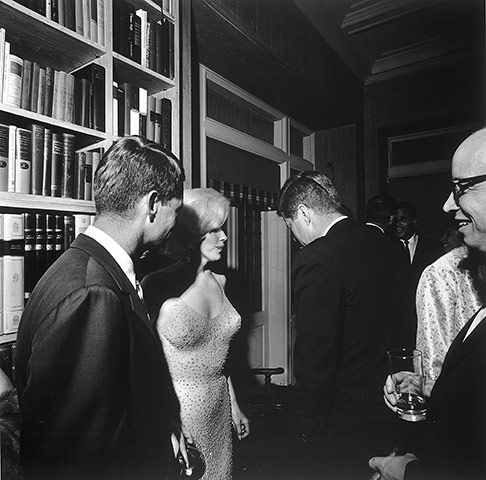 JFK Anniversary: Marilyn Monroe stands between Robert Kennedy and John F. Kennedy