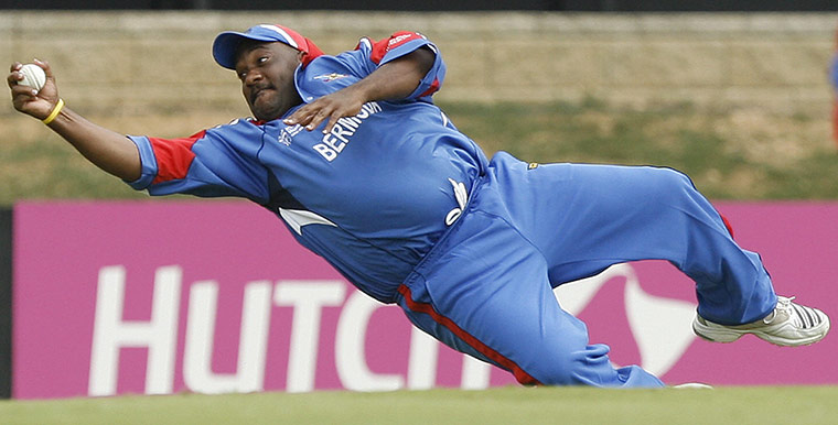 Fat Cricketers: Dwayne Leverock successfully dives to take a catch