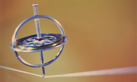 Gyroscope balancing on string