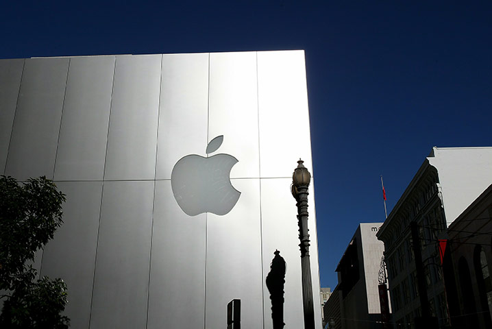 Week in business: The Apple logo is displayed on a store in San Francisco, California