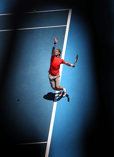 Melbourne Tennis Day 4: Rafael Nadal of Spain serves to Ryan Sweeting Melbourne Tennis