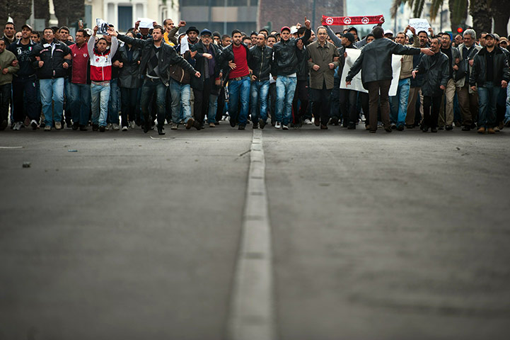 Tunisia protests: People demonstrate against Ben Ali's Constitutional Democratic Rally
