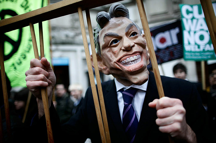 blair at iraq inquiry: A protestor wearing a Tony Blair mask