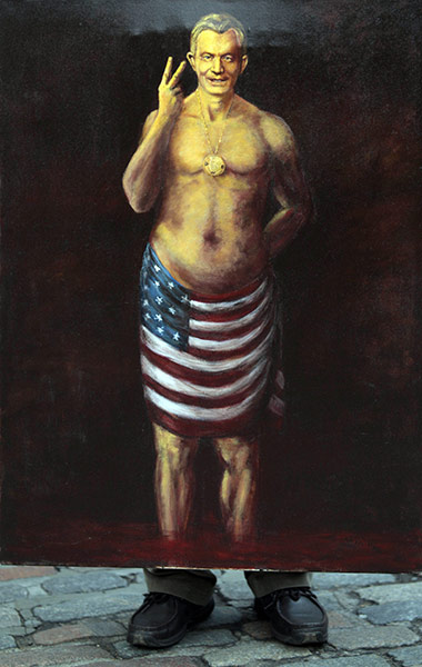 blair at chilcot: A protester holding a painting of Tony Blair