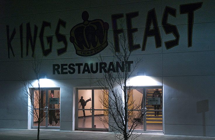 24 hours in pictures: Victoria, British Columbia, Canada: A figure skater prepares in the foyer