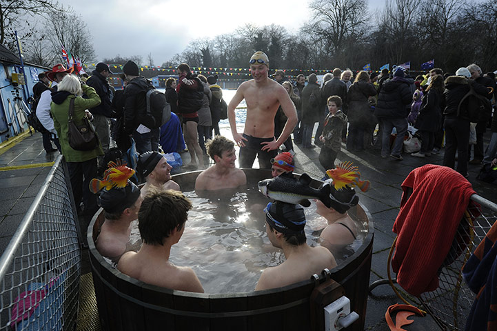 Cold water swimming: Swimmers get in a hot tub after competing