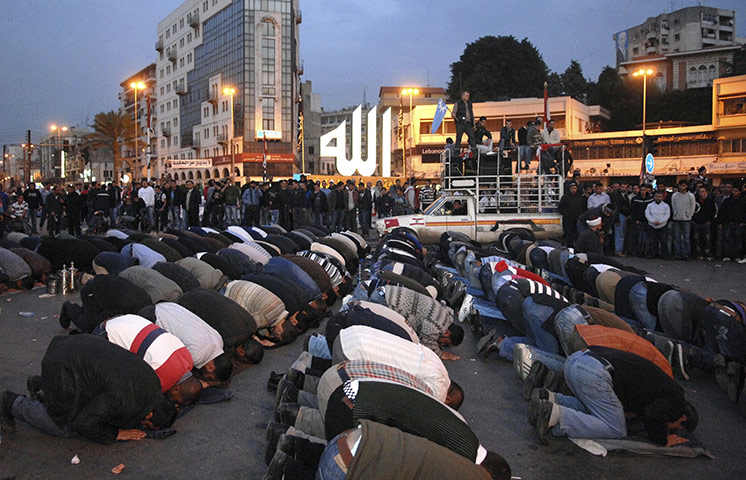 Lebanon Protests: Sunni supporters of Lebanese caretaker Prime Minister Saad Hariri pray