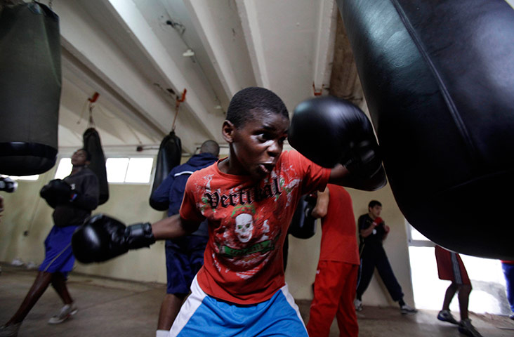 24 hours in pics: Cuba's young boxer Jose Salazar works out at a training session