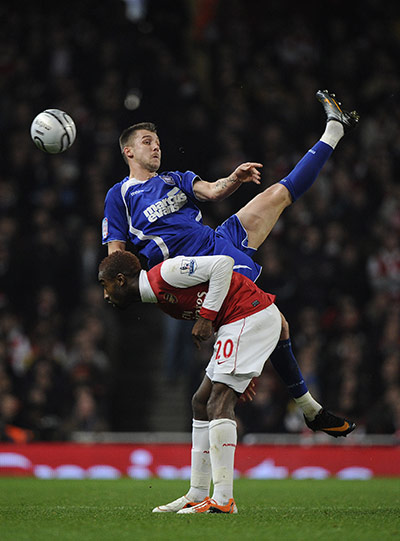 Arsenal v Ipswich Town: Ipswich's Tamas Priskin climbs above Arsenal's Johan Djourou