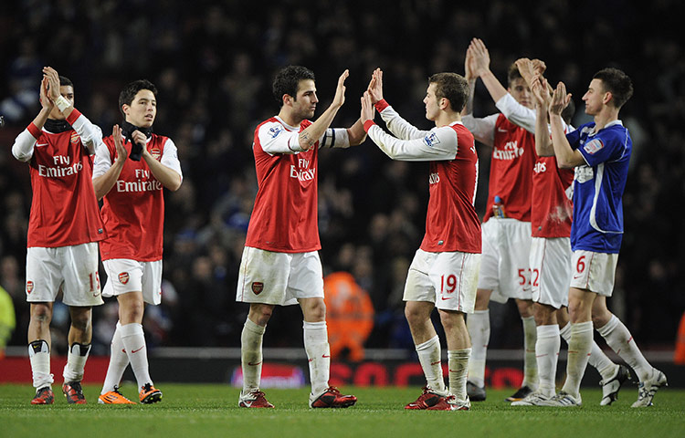 Arsenal v Ipswich Town: Arsenal players celebrate the win which puts them into the League Cup final