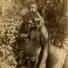 Australian Season: An indigenous man with a baby basket 