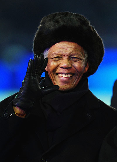 Mandela: Mandela waves at the World Cup Final match in Johannesburg, South Africa