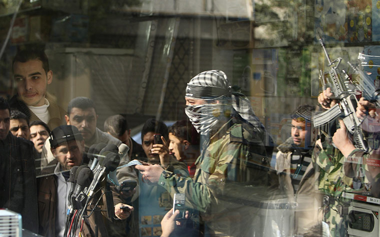 24 hours in pictures: gunmen from the Al-Aqsa brigade in Gaza City