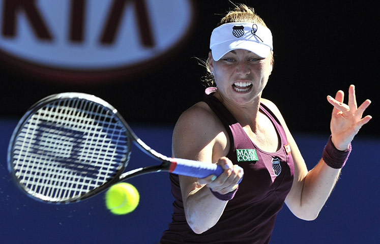 Melbourne Day 11: Vera Zvonareva of Russia returns against Clijsters