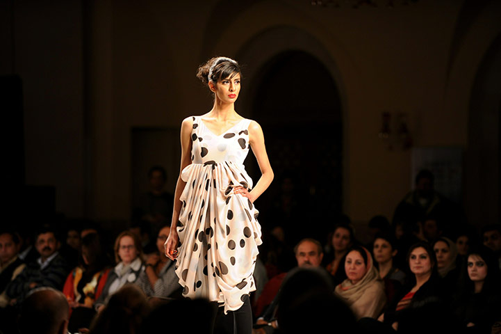 Islamabad Fashion Week: A Pakistani model presents a creation by Hameeda