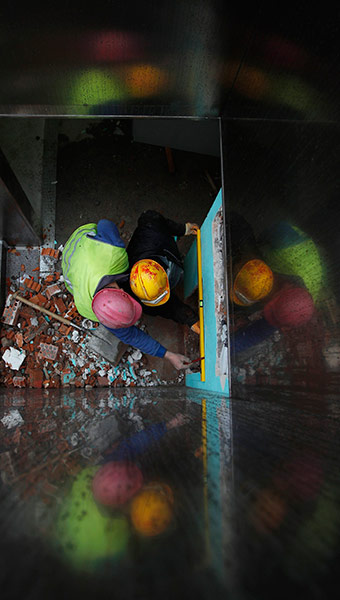 24 hours in pictures: Labourers work at a construction site in central Madrid