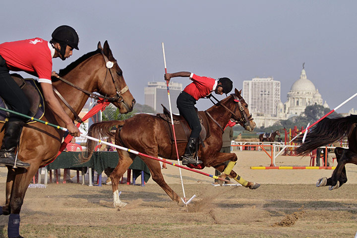 24 hours: Kolkata, India: Participants during the tent pegging event at a horse show