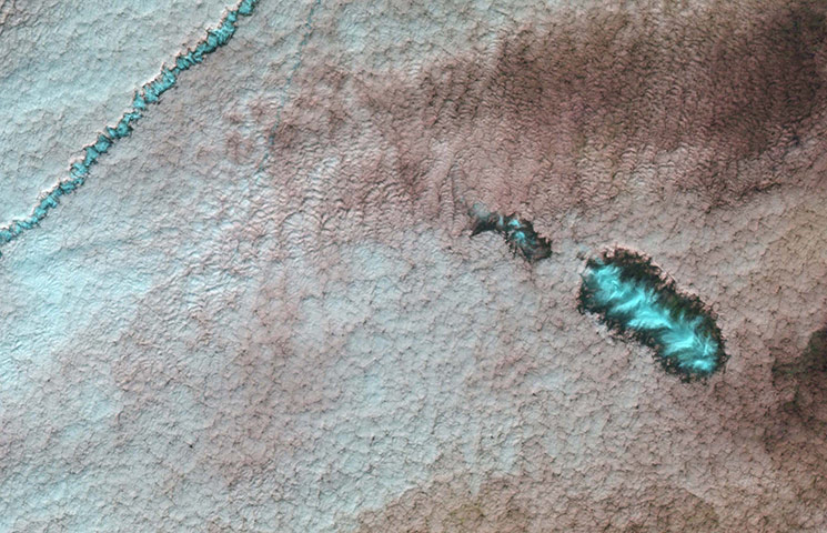 Satellite Eye on Earth: ice clouds : hole-punch clouds and canals