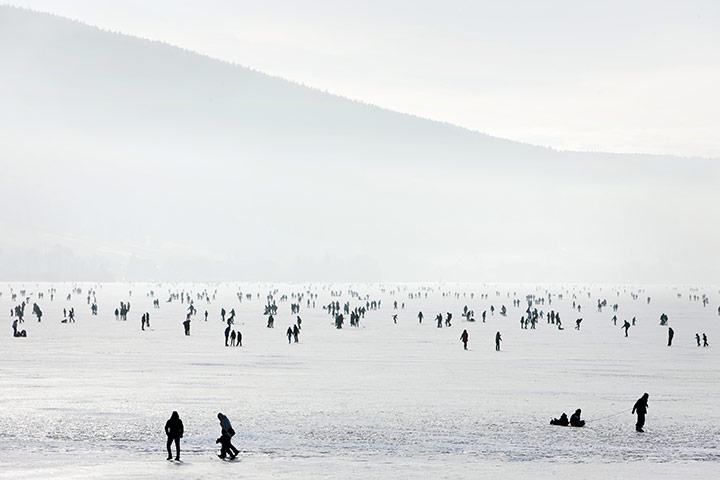 24 hours in pictures: People enjoy the frozen Lac de Joux at Le Pont