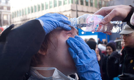 [Image: Protester-washing-eyes-007.jpg]