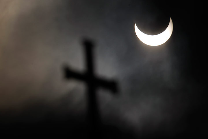 eclipse: A partial solar eclipse over Alexander Nevski cathedral in Sofia