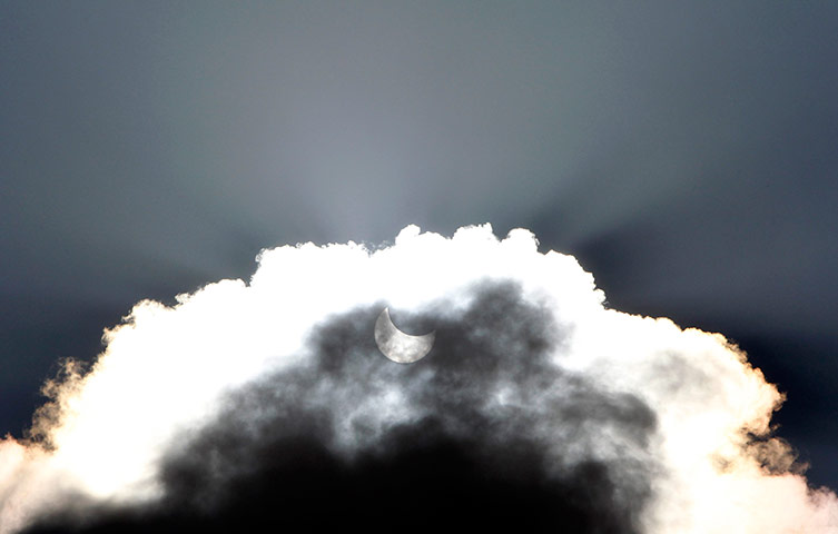 eclipse update: Partial solar eclipse through clouds in Amman