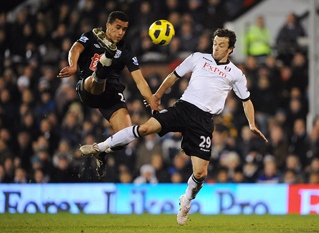Tuesday Premier League: Fulham's Simon Davies is beaten to the ball by West Brom's James Hurst 