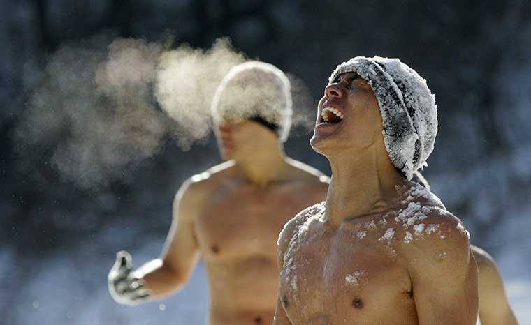 24 hours in pictures: South Korean Special Warfare Forces hurl snow during a winter exercise
