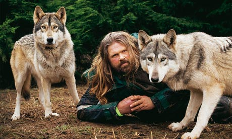 Man with wolves