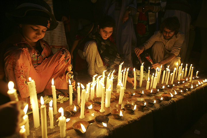 Salman Taseer Funeral: Members of Pakistan's Women Action light candles