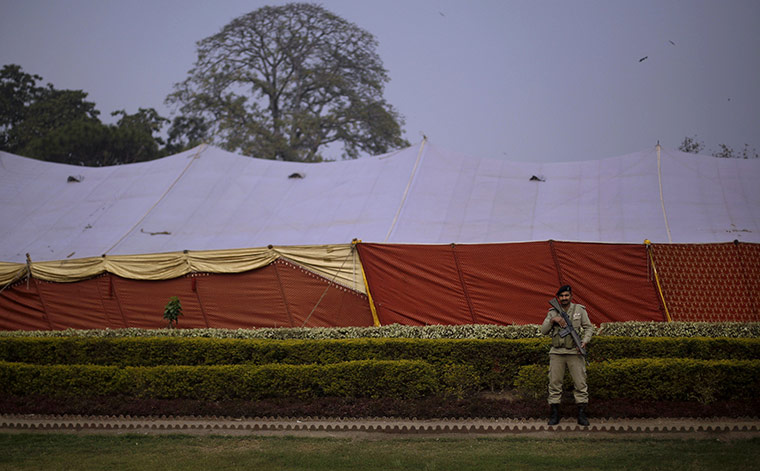 Salman Taseer Funeral: A Pakistani ranger looks on while standing guard during the funeral